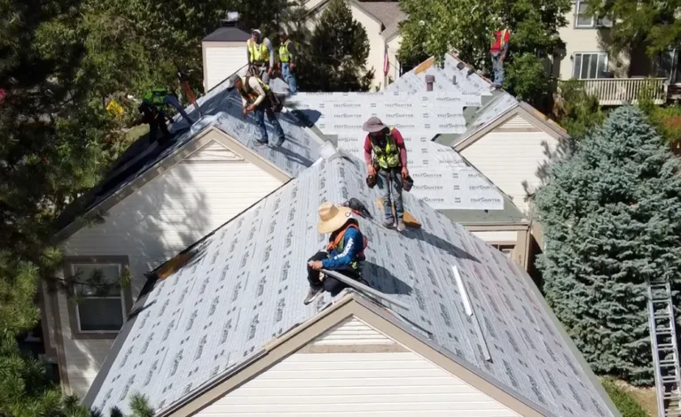 Roofers applying multi-family roofing for homes in Pleasant Grove